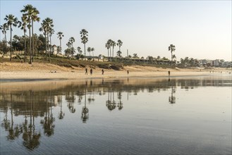 Reflection at low tide on the beach of Fajara and Kotu