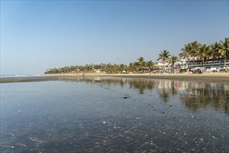 The wide beach of Kotu at low tide