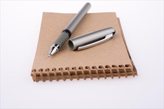 Pen on a spiral notebook