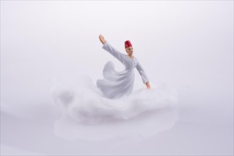 Sufi Dervis on a Cloud on a white background
