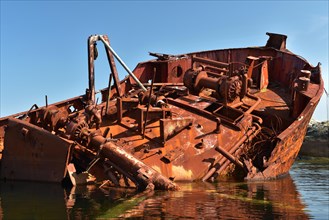 Rusty shipwreck on the Atlantic Strait in Norway