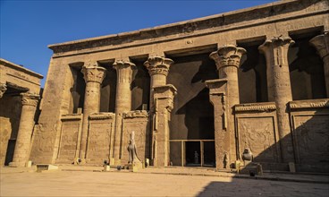 Facade with drawing of pharaohs of the Temple of Edfu in the city of Edfu