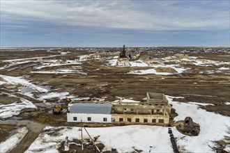 Aerial of an old wheat farm in the semi frozen earth