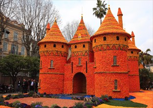 Replica of a castle made of lemons and oranges