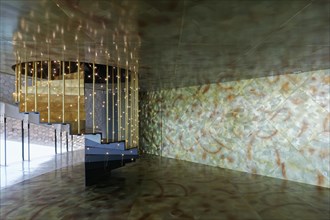 Interior with golden brown metal-look wall panels