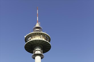 Television tower against a blue sky