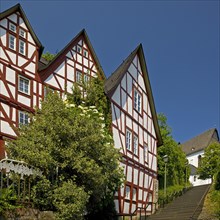 Half-timbered houses on the Schulberg with the stairs to the Protestant town church