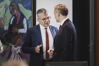 (R-L) Christian Lindner (FDP), Federal Minister of Finance, and Werner Gatzer, State Secretary at