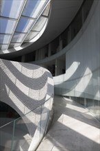 Futuristic atrium with light and shadow
