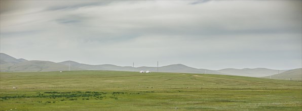 Two yurts standing in the steppe near Nalaikh. Nalaikh
