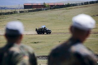 A Mongolian Army truck transports Mongolian soldiers during an exercise for UN peacekeeping missions. Nalaikh