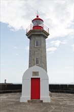 Farolim de Felgueiras lighthouse at the mouth of the Douro River into the Atlantic Ocean