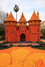 Replica of a castle made of lemons and oranges