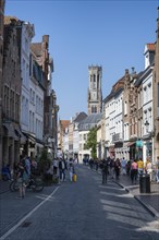 Pedestrian zone with the Belfry or Belfort in the old town of Bruges