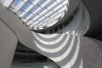 Futuristic atrium with light and shadow