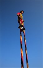 Stilt walkers in the street parade in Menton