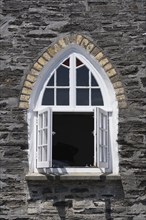 Gothic style windows on the former schoolhouse in Port Isaac