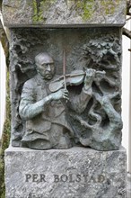 Bronze monument to the Norwegian musician and composer Per Bolstad