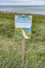 Conservation compliance sign on the footpath along the chalk cliffs of Dover