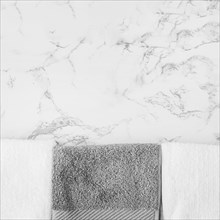 Black white towels marble backdrop