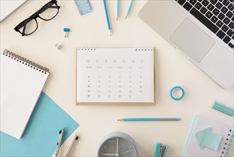 Flat lay desk calendar blue office accessories
