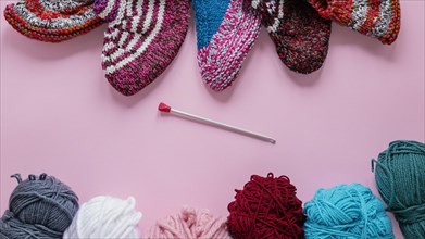 Top view knitting needles wool