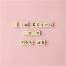 Motivational text pink background