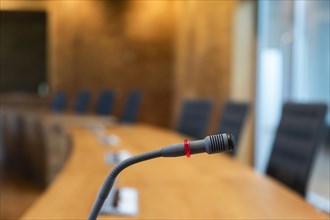 Close-up of a microphone in a meeting room