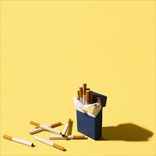 Cigarettes pack yellow background