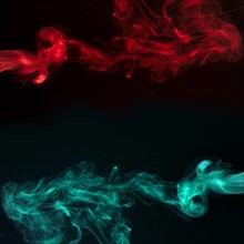 Abstract red turquoise smoke black dark background