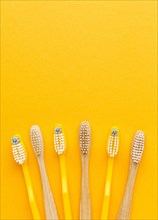 Top view collection organic toothbrushes with copy space