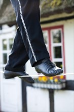 An artist on a tightrope