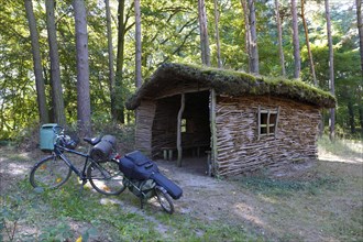 Rest hut made of natural materials in the forest