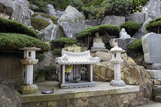 Small shrine and stone Buddha figures