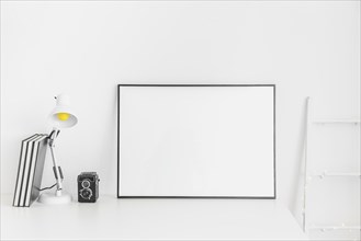 Stylish minimalistic workplace white color with whiteboard