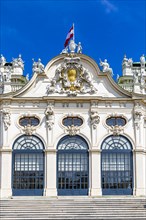 The Austrian flag flies over the main entrance of the upper baroque Belvedere Palace