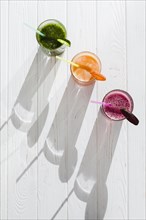Fresh healthy juices with straws