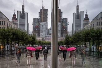 Passers-by walk along the Zeil in Frankfurt am Main during rainy weather. The summer of 2023 has so far proven to be very rainy compared to previous years.