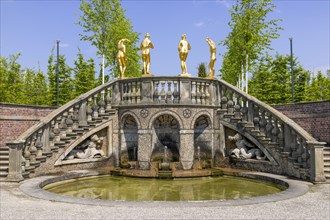 Small water features with gilded figures