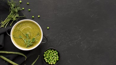 Top view winter peas soup with copy space