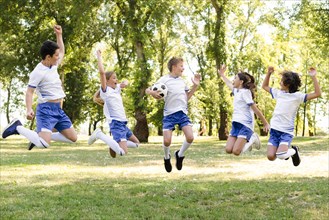 Kids sportswear jumping outdoors