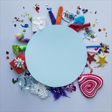 Blank blue circular frame birthday party items background