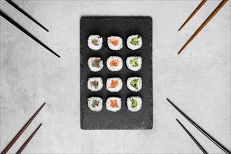 Flat lay delicious sushi board
