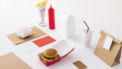 Fast food disposal cup sauce bottle parcel white background