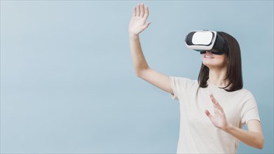 Front view woman experiencing virtual reality