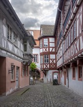 Alley with historic half-timbered houses