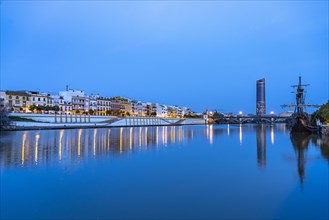Triana neighbourhood on the banks of the Guadalquivir River at dusk