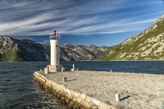 Lighthouse on the artificial island of Gospa od Skrpjela near Perast on the Bay of Kotor
