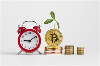 Bitcoin piles alarm clock