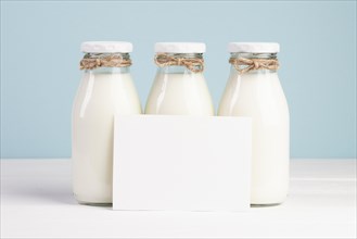 Milk bottles copy space card